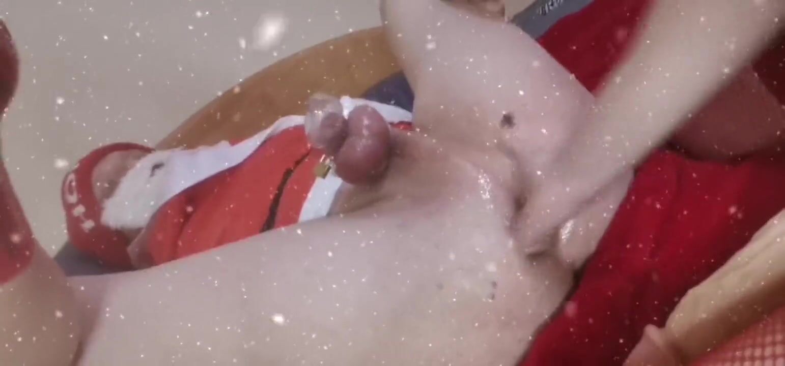 Gaiola de castidade trancada O Pai Natal recebe uma massagem à próstata da amante femdom que o faz gozar na sua gaiola assistir online imagem