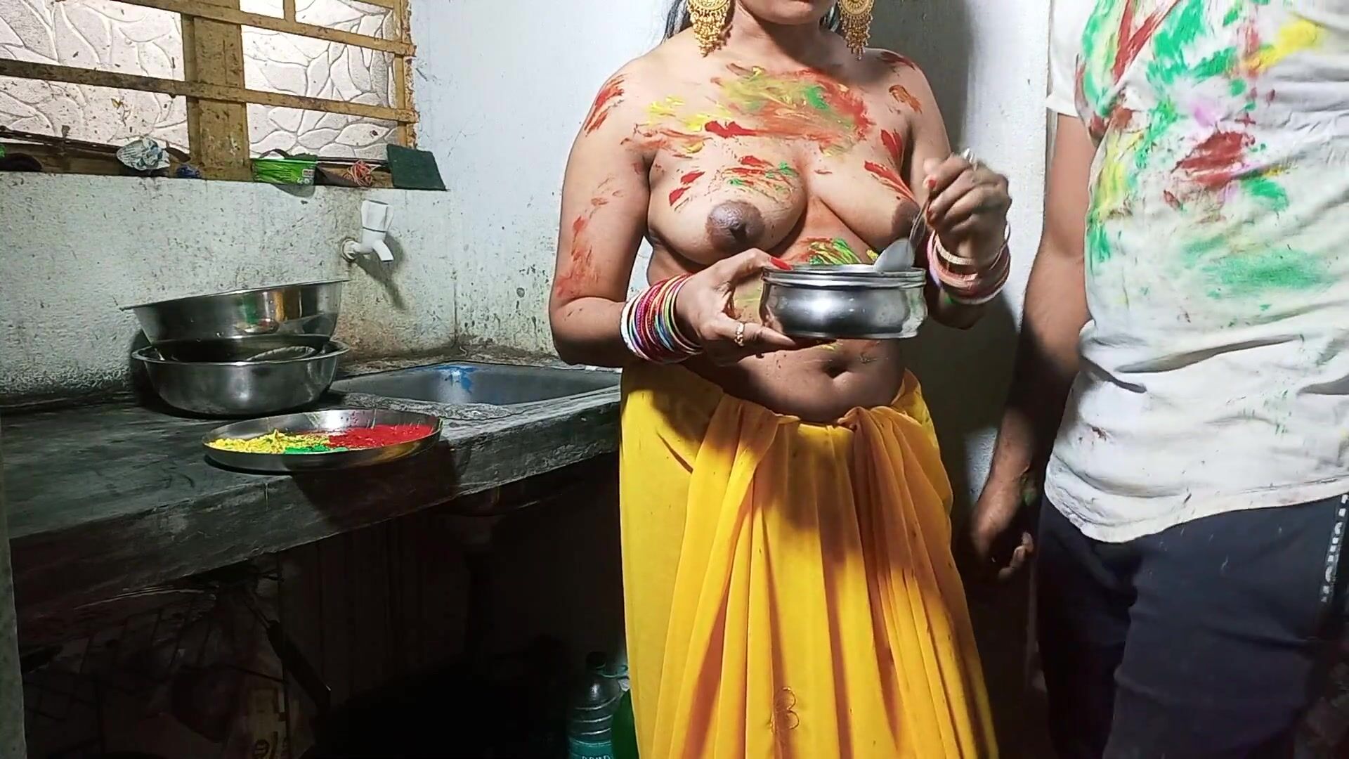 On Festival of HOLI Devar Fuck Cute Sexy Bhabhi on Kichen Stand After Applying Color on Her Boobs watch online image