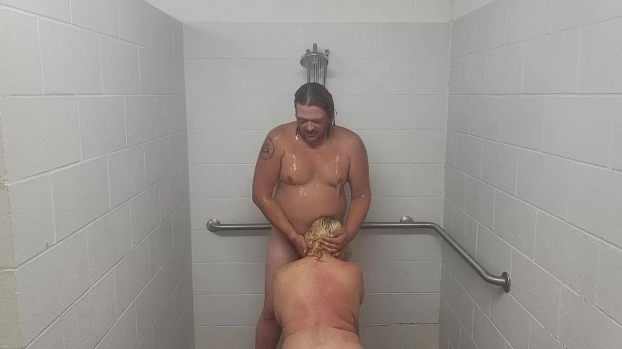 Husband and wife taking a shower with a quickie pic