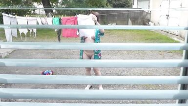 Naked in public. Neighbor saw pregnant neighbor in window who was drying clothes in yard without bra and panties. Nudist - 8 image